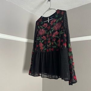 American Eagle black blouse with a variety of red flowers embroidered